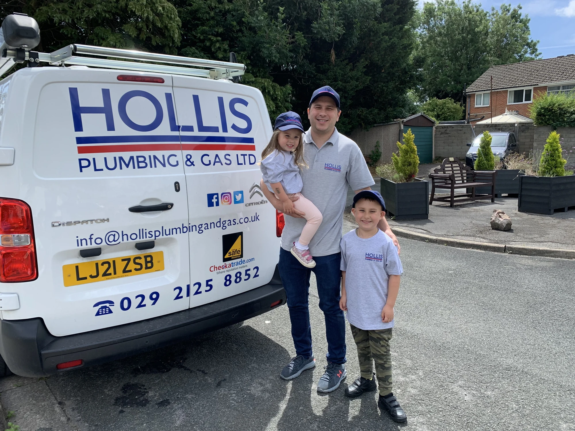 Edward Hollis and family with the Hollis Plumbing and Gas van